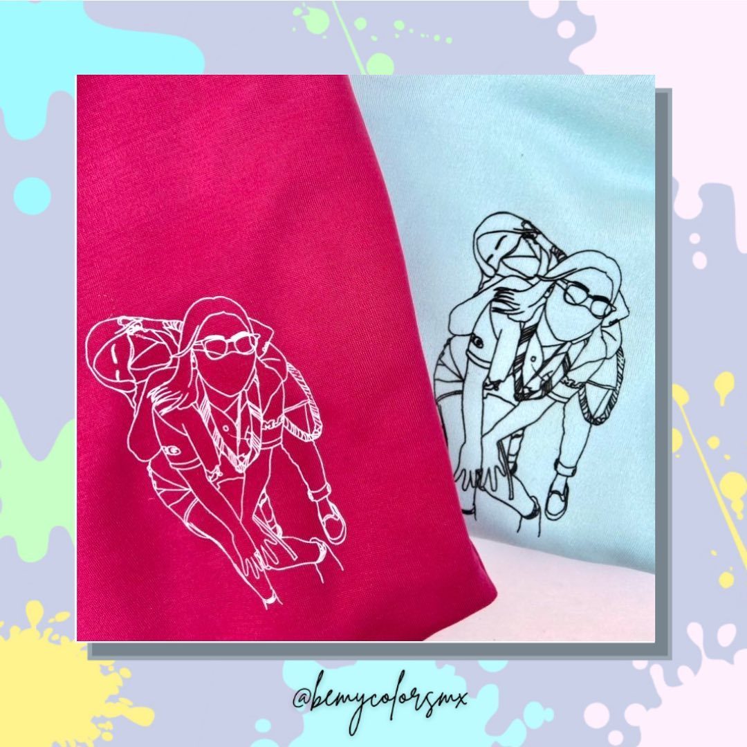 Sudaderas rosa y azul con ilustraciones de línea blanca